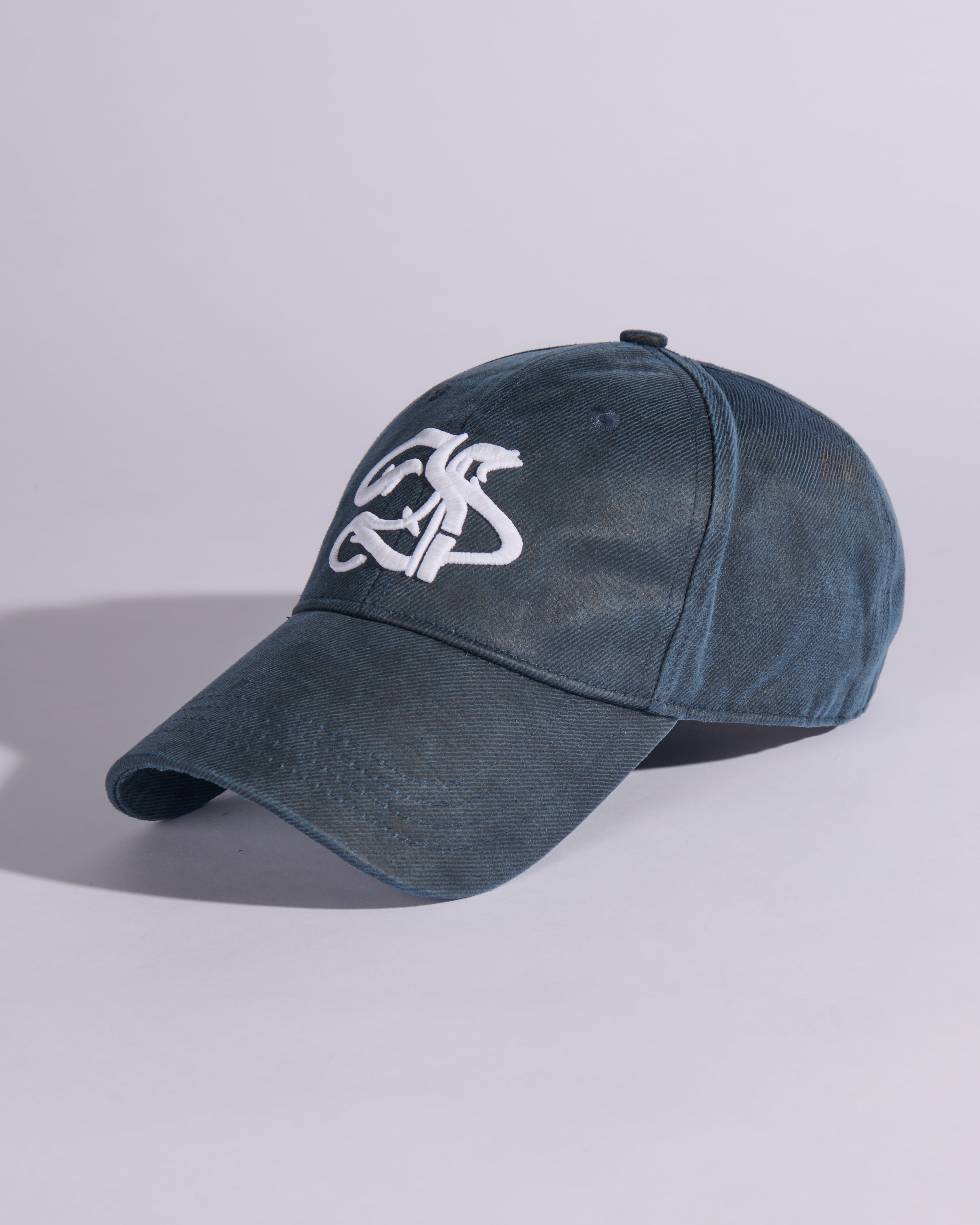 INSIGNIA WAXED COTTON BASEBALL CAP IN OBSIDIAN BLUE