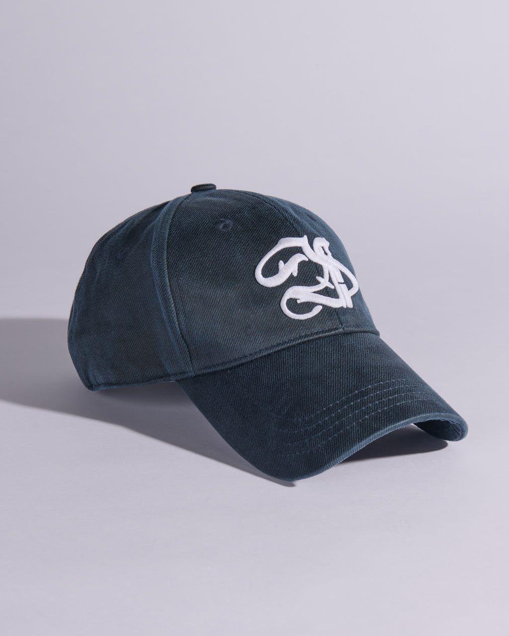 INSIGNIA WAXED COTTON BASEBALL CAP IN OBSIDIAN BLUE