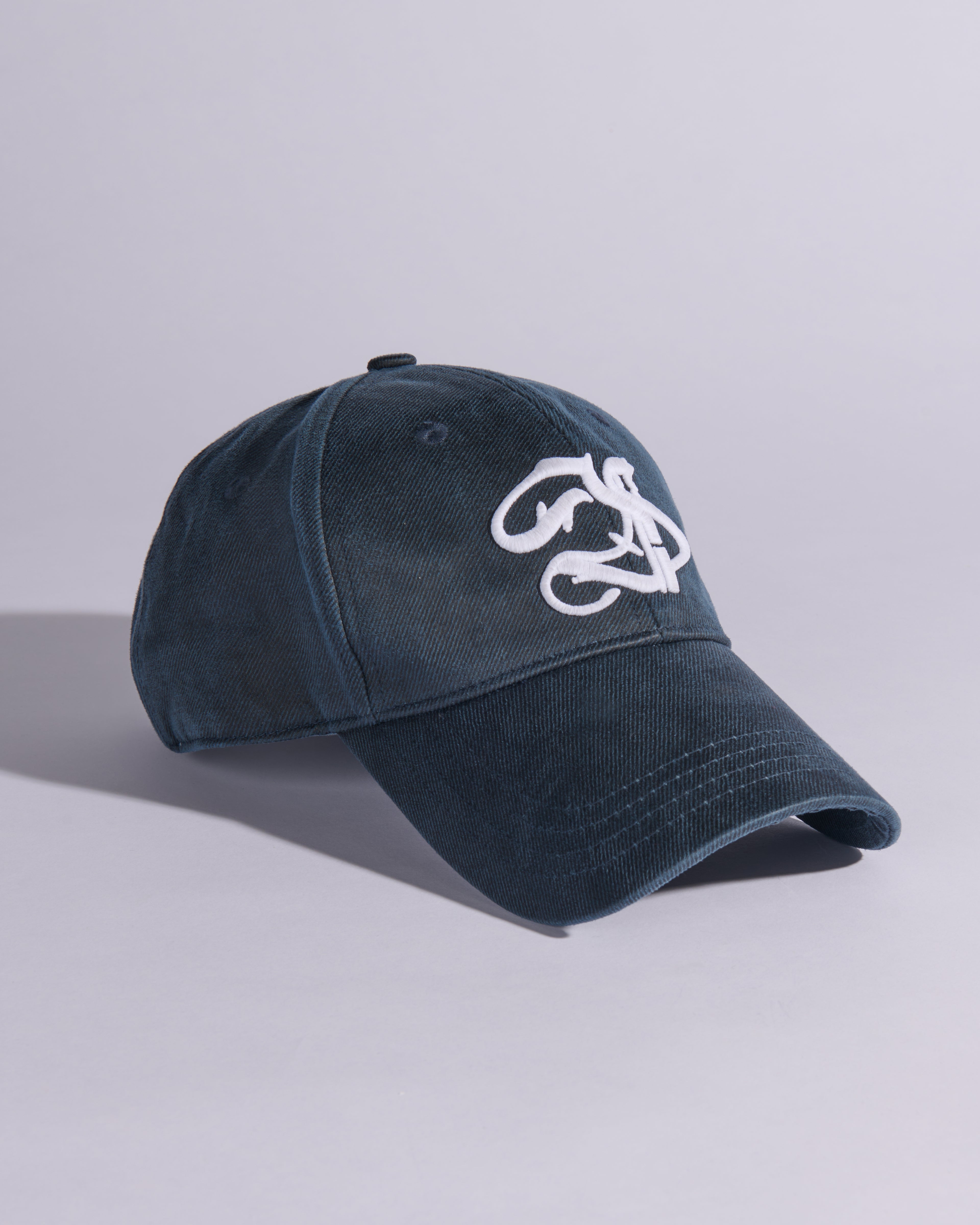 INSIGNIA WAXED COTTON BASEBALL CAP IN OBSIDIAN BLUE